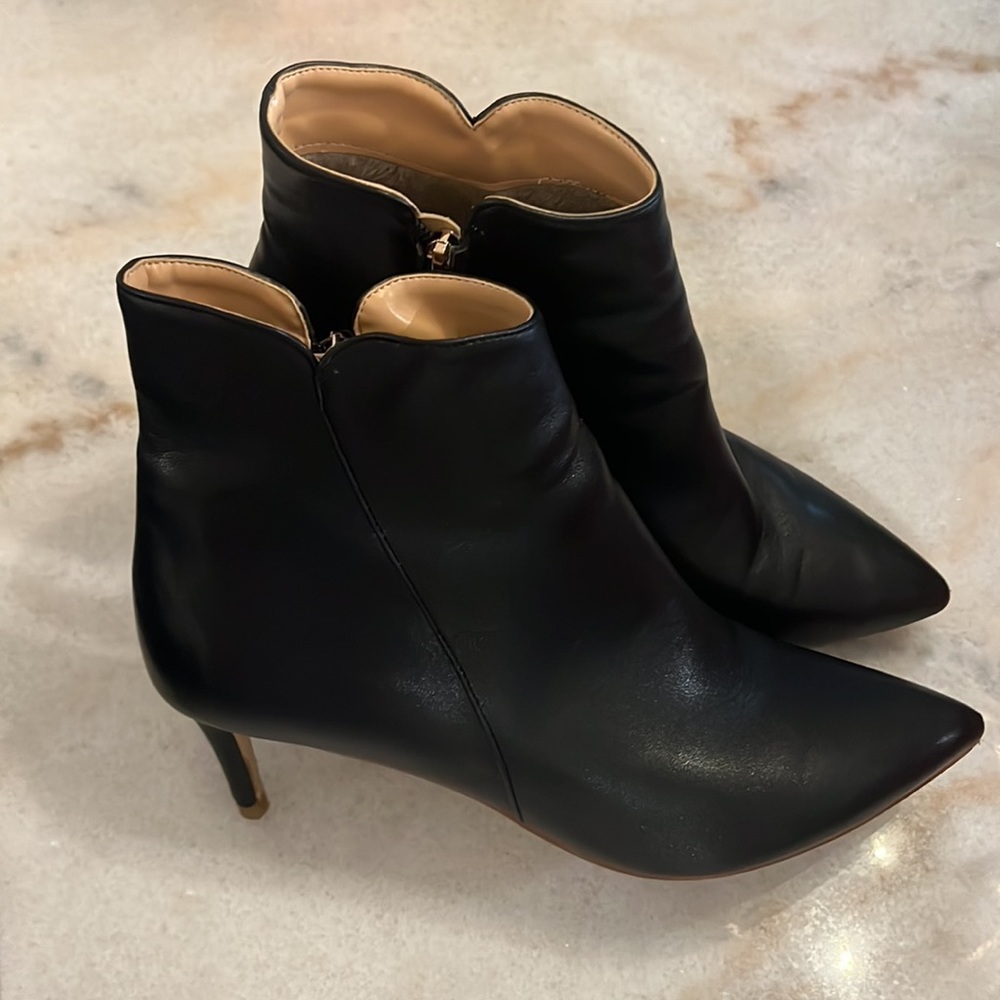 Black booties.
